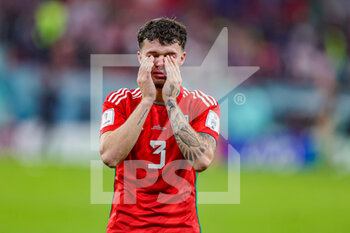 21/11/2022 - Neco Williams (3) of Wales shows emotions at full time during the FIFA World Cup 2022, Group B football match between United States and Wales on November 21, 2022 at Ahmad Bin Ali Stadium in Ar-Rayyan, Qatar - FOOTBALL - WORLD CUP 2022 - UNITED STATES V WALES - FIFA MONDIALI - CALCIO