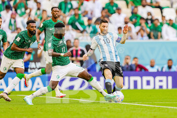 22/11/2022 - Lionel Messi (10) of Argentina tussles with Hassan Tambakti (17) of Saudi Arabia during the FIFA World Cup 2022, Group C football match between Argentina and Saudi Arabia on November 22, 2022 at Lusail Stadium in Al Daayen, Qatar - FOOTBALL - WORLD CUP 2022 - ARGENTINA V SAUDI ARABIA - FIFA MONDIALI - CALCIO