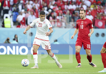 22/11/2022 - Mohamed Drager of Tunisia, Christian Eriksen of Denmark during the FIFA World Cup 2022, Group D football match between Denmark and Tunisia on November 22, 2022 at Education City Stadium in Doha, Qatar - FOOTBALL - WORLD CUP 2022 - DENMARK V TUNISIA - FIFA MONDIALI - CALCIO