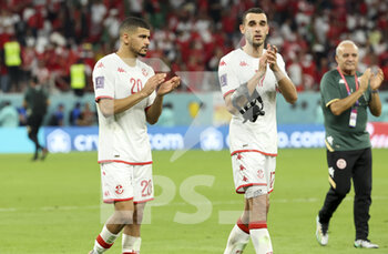 22/11/2022 - Mohamed Drager of Tunisia, Ellyes Skhiri of Tunisia applaud the fans following the FIFA World Cup 2022, Group D football match between Denmark and Tunisia on November 22, 2022 at Education City Stadium in Doha, Qatar - FOOTBALL - WORLD CUP 2022 - DENMARK V TUNISIA - FIFA MONDIALI - CALCIO