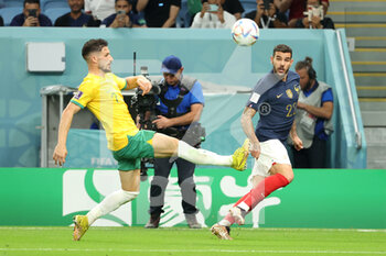 22/11/2022 - Matthew Leckie of Australia, Theo Hernandez of France during the FIFA World Cup 2022, Group D football match between France and Australia on November 22, 2022 at Al Janoub Stadium in Al Wakrah, Qatar - FOOTBALL - WORLD CUP 2022 - FRANCE V AUSTRALIA - FIFA MONDIALI - CALCIO