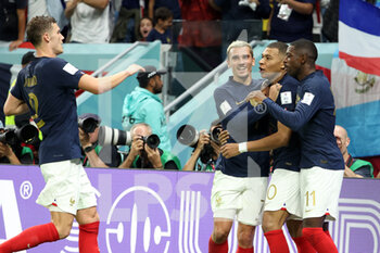22/11/2022 - Kylian Mbappe of France celebrates with Ousmane Dembele of France (R), Benjamin Pavard of France and Antoine Griezmann of France after putting his side 3-1 ahead during the FIFA World Cup 2022, Group D football match between France and Australia on November 22, 2022 at Al Janoub Stadium in Al Wakrah, Qatar - FOOTBALL - WORLD CUP 2022 - FRANCE V AUSTRALIA - FIFA MONDIALI - CALCIO
