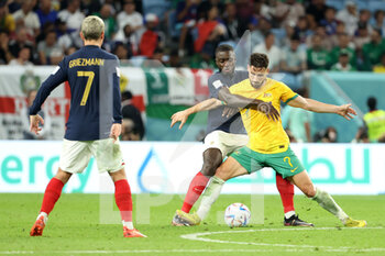 22/11/2022 - Dayot Upamecano of France, Matthew Leckie of Australia during the FIFA World Cup 2022, Group D football match between France and Australia on November 22, 2022 at Al Janoub Stadium in Al Wakrah, Qatar - FOOTBALL - WORLD CUP 2022 - FRANCE V AUSTRALIA - FIFA MONDIALI - CALCIO