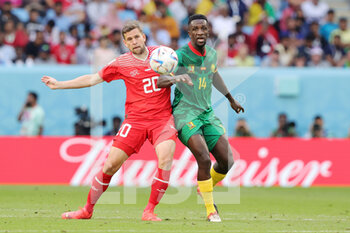 24/11/2022 - Fabian Frei of Switzerland and Samuel Gouet of Cameroon during the FIFA World Cup 2022, Group G football match between Switzerland and Cameroon on November 24, 2022 at Al Janoub Stadium in Al Wakrah, Qatar - FOOTBALL - WORLD CUP 2022 - SWITZERLAND V CAMEROON - FIFA MONDIALI - CALCIO