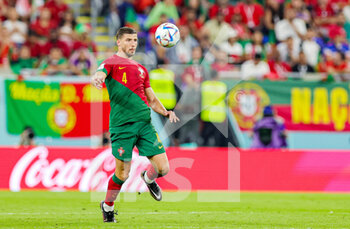 2022-11-24 - Ruben Dias (4) of Portugal during the Fifa World Cup 2022, Group H football match between Portugal and Ghana on November 24, 2022 at Stadium 974 in Doha, Qatar - FOOTBALL - WORLD CUP 2022 - PORTUGAL V GHANA - FIFA WORLD CUP - SOCCER