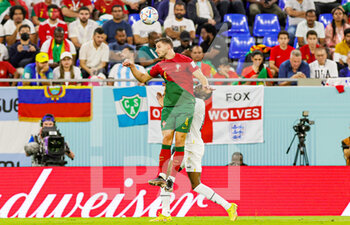 2022-11-24 - Ruben Dias (4) of Portugal heads the ball during the Fifa World Cup 2022, Group H football match between Portugal and Ghana on November 24, 2022 at Stadium 974 in Doha, Qatar - FOOTBALL - WORLD CUP 2022 - PORTUGAL V GHANA - FIFA WORLD CUP - SOCCER