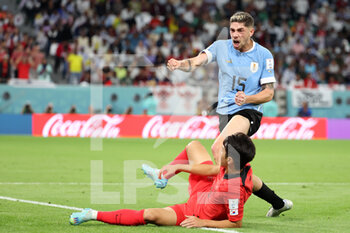 24/11/2022 - Lee Kang-In of South Korea, Federico Valverde of Uruguay during the FIFA World Cup 2022, Group H football match between Uruguay and Korea Republic on November 24, 2022 at Education City Stadium in Doha, Qatar - FOOTBALL - WORLD CUP 2022 - URUGUAY V KOREA REPUBLIC - FIFA MONDIALI - CALCIO