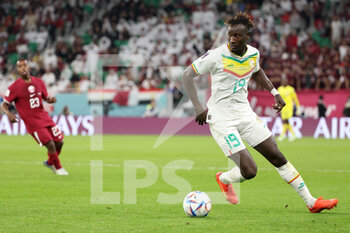 2022-11-25 - Famara Diedhiou of Senegal during the FIFA World Cup 2022, Group A football match between Qatar and Senegal on November 25, 2022 at Al Thumama Stadium in Doha, Qatar - FOOTBALL - WORLD CUP 2022 - QATAR V SENEGAL - FIFA WORLD CUP - SOCCER