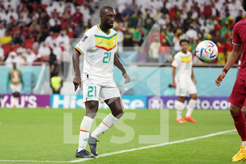 2022-11-25 - Youssouf Sabaly of Senegal during the FIFA World Cup 2022, Group A football match between Qatar and Senegal on November 25, 2022 at Al Thumama Stadium in Doha, Qatar - FOOTBALL - WORLD CUP 2022 - QATAR V SENEGAL - FIFA WORLD CUP - SOCCER