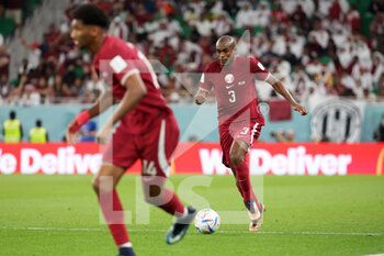 2022-11-25 - Abdelkarim Hassan of Qatar during the FIFA World Cup 2022, Group A football match between Qatar and Senegal on November 25, 2022 at Al Thumama Stadium in Doha, Qatar - FOOTBALL - WORLD CUP 2022 - QATAR V SENEGAL - FIFA WORLD CUP - SOCCER