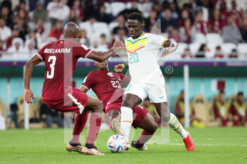 2022-11-25 - Cheikh Dieng of Senegal during the FIFA World Cup 2022, Group A football match between Qatar and Senegal on November 25, 2022 at Al Thumama Stadium in Doha, Qatar - FOOTBALL - WORLD CUP 2022 - QATAR V SENEGAL - FIFA WORLD CUP - SOCCER