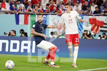 2022-11-26 - Theo Hernandez of France, Jesper Lindstrom of Denmark during the FIFA World Cup 2022, Group D football match between France and Denmark on November 26, 2022 at Stadium 974 in Doha, Qatar - FOOTBALL - WORLD CUP 2022 - FRANCE V DENMARK - FIFA WORLD CUP - SOCCER