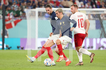 2022-11-26 - Adrien Rabiot of France, Antoine Griezmann of France, Christian Eriksen of Denmark during the FIFA World Cup 2022, Group D football match between France and Denmark on November 26, 2022 at Stadium 974 in Doha, Qatar - FOOTBALL - WORLD CUP 2022 - FRANCE V DENMARK - FIFA WORLD CUP - SOCCER