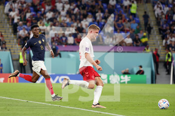 2022-11-26 - Andreas Cornelius of Denmark, Aurelien Tchouameni of France (L) during the FIFA World Cup 2022, Group D football match between France and Denmark on November 26, 2022 at Stadium 974 in Doha, Qatar - FOOTBALL - WORLD CUP 2022 - FRANCE V DENMARK - FIFA WORLD CUP - SOCCER