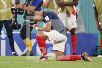 2022-11-26 - Kylian Mbappe of France celebrates as he scores the goal 1:0 during the FIFA World Cup 2022, Group D football match between France and Denmark on November 26, 2022 at Stadium 974 in Doha, Qatar - FOOTBALL - WORLD CUP 2022 - FRANCE V DENMARK - FIFA WORLD CUP - SOCCER