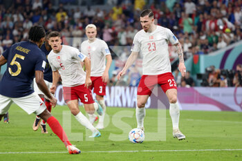 2022-11-26 - Pierre-Emile Hojbjerg of Denmark, Joakim Maehle of Denmark (L) during the FIFA World Cup 2022, Group D football match between France and Denmark on November 26, 2022 at Stadium 974 in Doha, Qatar - FOOTBALL - WORLD CUP 2022 - FRANCE V DENMARK - FIFA WORLD CUP - SOCCER