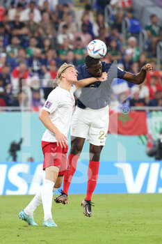 2022-11-26 - Jens Stryger Larsen of Denmark, Ibrahima Konate of France during the FIFA World Cup 2022, Group D football match between France and Denmark on November 26, 2022 at Stadium 974 in Doha, Qatar - FOOTBALL - WORLD CUP 2022 - FRANCE V DENMARK - FIFA WORLD CUP - SOCCER