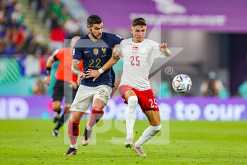 2022-11-26 - Jesper Lindstrom (25) of Denmark battles with Theo Hernandez of France during the FIFA World Cup 2022, Group D football match between France and Denmark on November 26, 2022 at Stadium 974 in Doha, Qatar - FOOTBALL - WORLD CUP 2022 - FRANCE V DENMARK - FIFA WORLD CUP - SOCCER