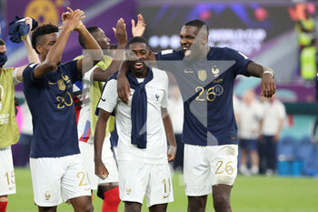 2022-11-26 - Kingsley Coman of France, Ousmane Dembele of France, Marcus Thuram of France celebrate winning following the FIFA World Cup 2022, Group D football match between France and Denmark on November 26, 2022 at Stadium 974 in Doha, Qatar - FOOTBALL - WORLD CUP 2022 - FRANCE V DENMARK - FIFA WORLD CUP - SOCCER