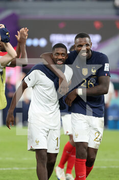 2022-11-26 - Ousmane Dembele of France, Marcus Thuram of France celebrate winning following the FIFA World Cup 2022, Group D football match between France and Denmark on November 26, 2022 at Stadium 974 in Doha, Qatar - FOOTBALL - WORLD CUP 2022 - FRANCE V DENMARK - FIFA WORLD CUP - SOCCER