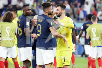 2022-11-26 - Marcus Thuram of France, Olivier Giroud of France, France goalkeeper Hugo Lloris celebrate winning following the FIFA World Cup 2022, Group D football match between France and Denmark on November 26, 2022 at Stadium 974 in Doha, Qatar - FOOTBALL - WORLD CUP 2022 - FRANCE V DENMARK - FIFA WORLD CUP - SOCCER