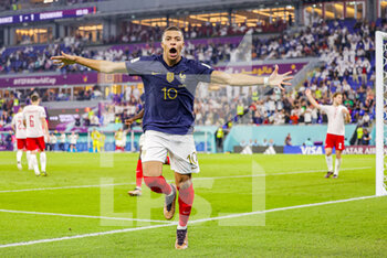 2022-11-26 - Kylian Mbappe (10) of France scores a goal and celebrates 2-1 during the FIFA World Cup 2022, Group D football match between France and Denmark on November 26, 2022 at Stadium 974 in Doha, Qatar - FOOTBALL - WORLD CUP 2022 - FRANCE V DENMARK - FIFA WORLD CUP - SOCCER