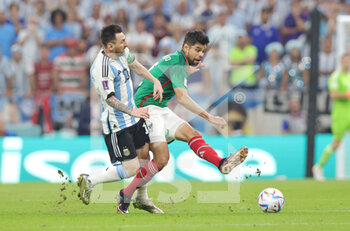 2022-11-26 - Nestor Araujo of Mexico and Lionel Messi of Argentina during the FIFA World Cup 2022, Group C football match between Argentina and Mexico on November 26, 2022 at Lusail Stadium in Al Daayen, Qatar - FOOTBALL - WORLD CUP 2022 - ARGENTINA V MEXICO - FIFA WORLD CUP - SOCCER