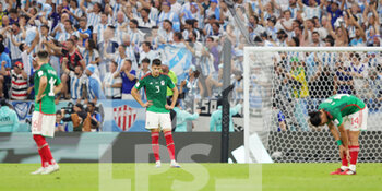 2022-11-26 - Cesar Montes of Mexico looks dejected after the 2-0 goal during the FIFA World Cup 2022, Group C football match between Argentina and Mexico on November 26, 2022 at Lusail Stadium in Al Daayen, Qatar - FOOTBALL - WORLD CUP 2022 - ARGENTINA V MEXICO - FIFA WORLD CUP - SOCCER