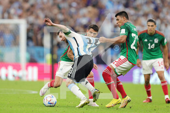 2022-11-26 - Lionel Messi of Argentina and Hector Moreno, Jesus Gallardo of Mexico during the FIFA World Cup 2022, Group C football match between Argentina and Mexico on November 26, 2022 at Lusail Stadium in Al Daayen, Qatar - FOOTBALL - WORLD CUP 2022 - ARGENTINA V MEXICO - FIFA WORLD CUP - SOCCER