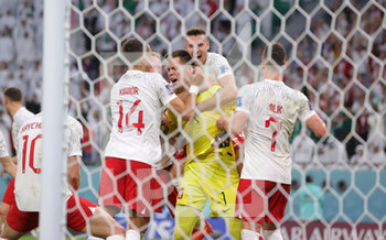 2022-11-26 - Wojciech Szczesny of Poland celebrates after saving a penalty during the FIFA World Cup 2022, Group C football match between Poland and Saudi Arabia on November 26, 2022 at Education City Stadium in Doha, Qatar - FOOTBALL - WORLD CUP 2022 - POLAND V SAUDI ARABIA - FIFA WORLD CUP - SOCCER