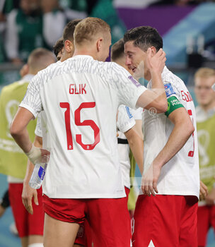 2022-11-26 - Robert Lewandowski of Poland celebrates his goal 2-0 with Kamil Glik during the FIFA World Cup 2022, Group C football match between Poland and Saudi Arabia on November 26, 2022 at Education City Stadium in Doha, Qatar - FOOTBALL - WORLD CUP 2022 - POLAND V SAUDI ARABIA - FIFA WORLD CUP - SOCCER