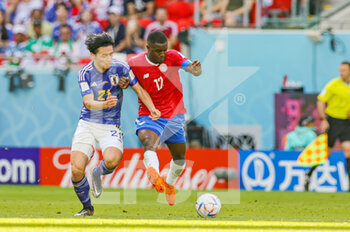 27/11/2022 - Ayase Ueda (21) of Japan tussles with Yeltsin Tejeda (17) of Costa Rica during the Fifa World Cup 2022, Group E football match between Japan and Costa Rica on November 27, 2022 at Ahmad bin Ali Stadium in Al Rayyan, Qatar - FOOTBALL - WORLD CUP 2022 - JAPAN V COSTA RICA - FIFA MONDIALI - CALCIO