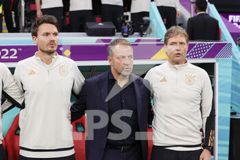 2022-11-27 - Assistant coach Danny Rohl, Head coach Hansi Flick, Assistant coach Marcus Sorg of Germany during the FIFA World Cup 2022, Group E football match between Spain and Germany on November 27, 2022 at Al Bayt Stadium in Al Khor, Qatar - FOOTBALL - WORLD CUP 2022 - SPAIN V GERMANY - FIFA WORLD CUP - SOCCER