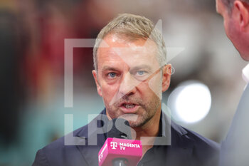 2022-11-27 - Head coach Hansi Flick of Germany during the FIFA World Cup 2022, Group E football match between Spain and Germany on November 27, 2022 at Al Bayt Stadium in Al Khor, Qatar - FOOTBALL - WORLD CUP 2022 - SPAIN V GERMANY - FIFA WORLD CUP - SOCCER