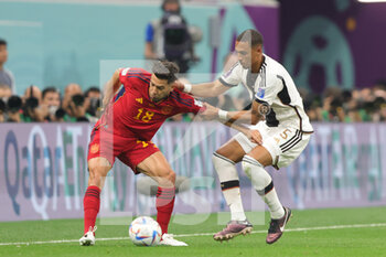2022-11-27 - Jordi Alba of Spain, Thilo Kehrer of Germany during the FIFA World Cup 2022, Group E football match between Spain and Germany on November 27, 2022 at Al Bayt Stadium in Al Khor, Qatar - FOOTBALL - WORLD CUP 2022 - SPAIN V GERMANY - FIFA WORLD CUP - SOCCER