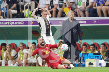 2022-11-27 - Dani Carvajal of Spain is fouled by David Raum of Germany during the FIFA World Cup 2022, Group E football match between Spain and Germany on November 27, 2022 at Al Bayt Stadium in Al Khor, Qatar - FOOTBALL - WORLD CUP 2022 - SPAIN V GERMANY - FIFA WORLD CUP - SOCCER