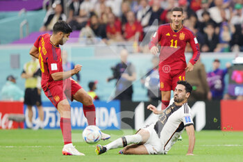 2022-11-27 - Marco Asensio of Spain, Ilkay Gundogan of Germany during the FIFA World Cup 2022, Group E football match between Spain and Germany on November 27, 2022 at Al Bayt Stadium in Al Khor, Qatar - FOOTBALL - WORLD CUP 2022 - SPAIN V GERMANY - FIFA WORLD CUP - SOCCER