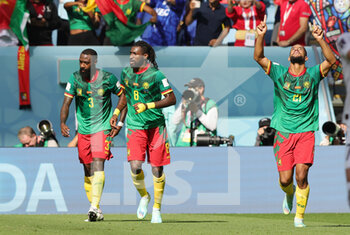 2022-11-28 - Jean-Charles Castelletto of Cameroon celebrates his goal 1-0, Nicolas N'Koulou, Andre-Frank Zambo Anguissa during the FIFA World Cup 2022, Group G football match between Cameroon and Serbia on November 28, 2022 at Al Janoub Stadium in Al Wakrah, Qatar - FOOTBALL - WORLD CUP 2022 - CAMEROON V SERBIA - FIFA WORLD CUP - SOCCER