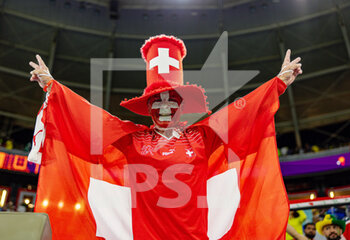 2022-11-29 - Switzerland fans during the FIFA World Cup 2022, Group G football match between Brazil and Switzerland on November 28, 2022 at Stadium 974 in Doha, Qatar - FOOTBALL - WORLD CUP 2022 - BRAZIL V SWITZERLAND - FIFA WORLD CUP - SOCCER