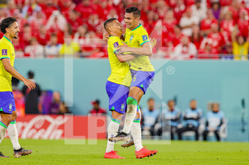 2022-11-29 - Casemiro (5) of Brazil scores a goal and celebrates 1-0 with Thiago Silva during the FIFA World Cup 2022, Group G football match between Brazil and Switzerland on November 28, 2022 at Stadium 974 in Doha, Qatar - FOOTBALL - WORLD CUP 2022 - BRAZIL V SWITZERLAND - FIFA WORLD CUP - SOCCER