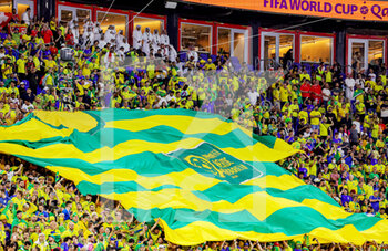 2022-11-29 - flag among the Brazil fans during the FIFA World Cup 2022, Group G football match between Brazil and Switzerland on November 28, 2022 at Stadium 974 in Doha, Qatar - FOOTBALL - WORLD CUP 2022 - BRAZIL V SWITZERLAND - FIFA WORLD CUP - SOCCER