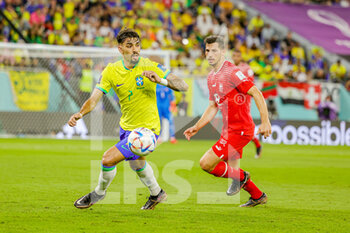2022-11-29 - Lucas Paqueta (7) of Brazil, Remo Freuler of Switzerland during the FIFA World Cup 2022, Group G football match between Brazil and Switzerland on November 28, 2022 at Stadium 974 in Doha, Qatar - FOOTBALL - WORLD CUP 2022 - BRAZIL V SWITZERLAND - FIFA WORLD CUP - SOCCER