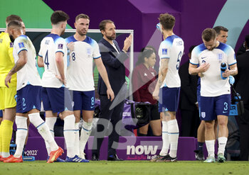 2022-11-29 - Coach of England Gareth Southgate talks to his players during the FIFA World Cup 2022, Group B football match between Wales and England on November 29, 2022 at Ahmad Bin Ali Stadium in Ar-Rayyan, Qatar - FOOTBALL - WORLD CUP 2022 - WALES V ENGLAND - FIFA WORLD CUP - SOCCER