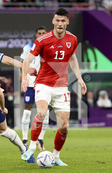 2022-11-29 - Kieffer Moore of Wales during the FIFA World Cup 2022, Group B football match between Wales and England on November 29, 2022 at Ahmad Bin Ali Stadium in Ar-Rayyan, Qatar - FOOTBALL - WORLD CUP 2022 - WALES V ENGLAND - FIFA WORLD CUP - SOCCER