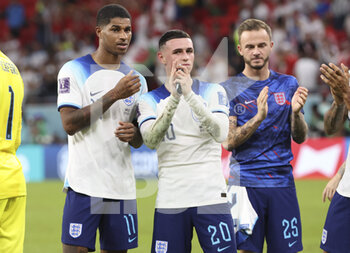 2022-11-29 - Marcus Rashford, Phil Foden, James Maddison of England celebrate the victory following the FIFA World Cup 2022, Group B football match between Wales and England on November 29, 2022 at Ahmad Bin Ali Stadium in Ar-Rayyan, Qatar - FOOTBALL - WORLD CUP 2022 - WALES V ENGLAND - FIFA WORLD CUP - SOCCER
