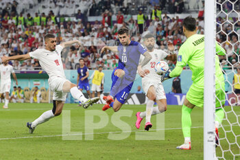 2022-11-29 - Christian Pulisic of USA scores a goal 0-1, Majid Hosseini and Alireza Beiranvand of Iran during the FIFA World Cup 2022, Group B football match between Iran and United States on November 29, 2022 at Al Thumama Stadium in Doha, Qatar - FOOTBALL - WORLD CUP 2022 - IRAN V UNITED STATES - FIFA WORLD CUP - SOCCER