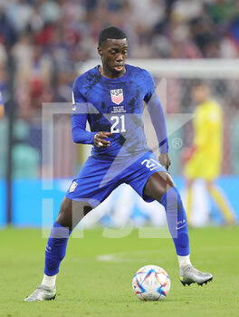 2022-11-29 - Timothy Weah of USA during the FIFA World Cup 2022, Group B football match between Iran and United States on November 29, 2022 at Al Thumama Stadium in Doha, Qatar - FOOTBALL - WORLD CUP 2022 - IRAN V UNITED STATES - FIFA WORLD CUP - SOCCER