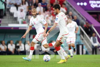 2022-11-30 - Aissa Laidouni of Tunisia, Mohamed Ali Ben Romdhane of Tunisia during the FIFA World Cup 2022, Group D football match between Tunisia and France on November 30, 2022 at Education City Stadium in Doha, Qatar - FOOTBALL - WORLD CUP 2022 - TUNISIA V FRANCE - FIFA WORLD CUP - SOCCER