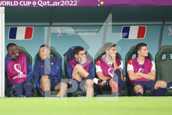 2022-11-30 - Marcus Thuram of France, Kylian Mbappe of France, Theo Hernandez of France, Olivier Giroud of France, Benjamin Pavard of France on the bench during the FIFA World Cup 2022, Group D football match between Tunisia and France on November 30, 2022 at Education City Stadium in Doha, Qatar - FOOTBALL - WORLD CUP 2022 - TUNISIA V FRANCE - FIFA WORLD CUP - SOCCER