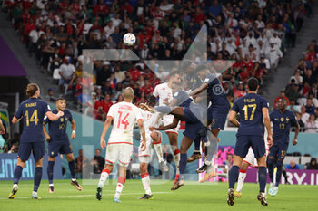2022-11-30 - Ibrahima Konate of France (C) during the FIFA World Cup 2022, Group D football match between Tunisia and France on November 30, 2022 at Education City Stadium in Doha, Qatar - FOOTBALL - WORLD CUP 2022 - TUNISIA V FRANCE - FIFA WORLD CUP - SOCCER
